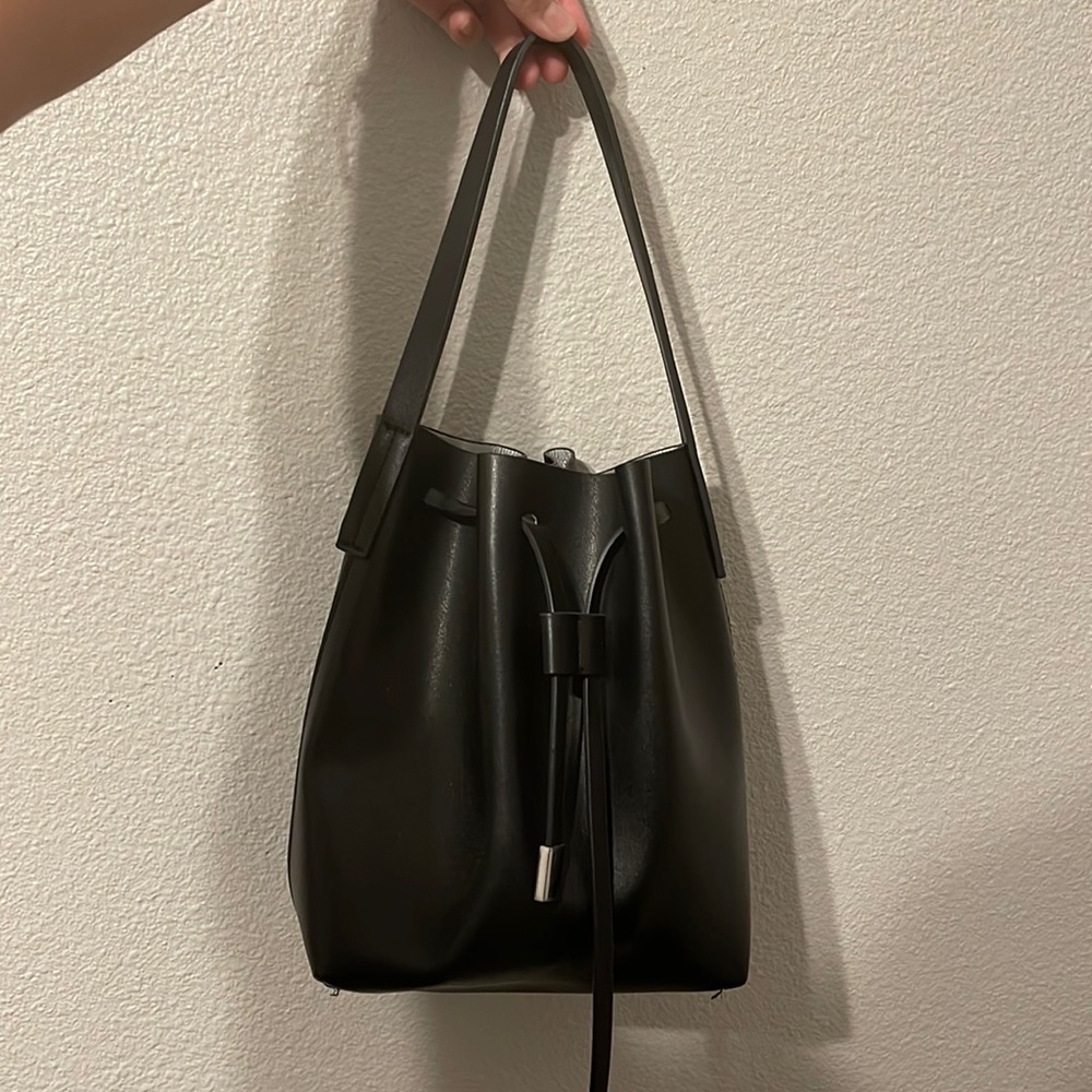 black leather bucket handbag